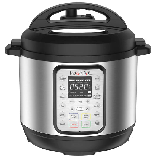 A stainless steel and black Instant Pot Duo Plus Mini 3-Quart 9-in-1 pressure cooker sitting on a modern kitchen countertop.